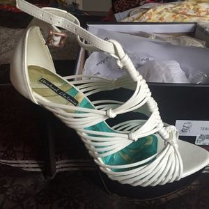 White heels with gold bottom size 9