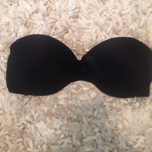 A strapless black pushup bathing suit