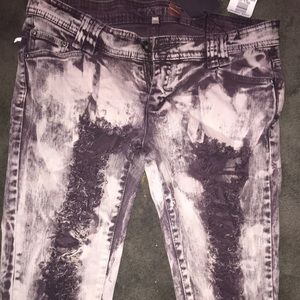 Brown acid wash jeans with destruction