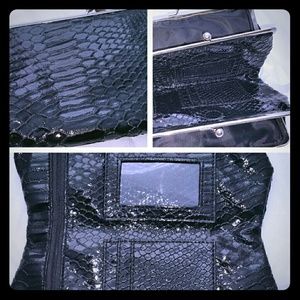 Little Black Patten Clutch