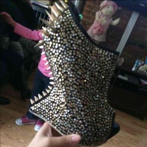 Black and gold spiked heels