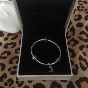 Pandora bracelet with stoppers and J charm