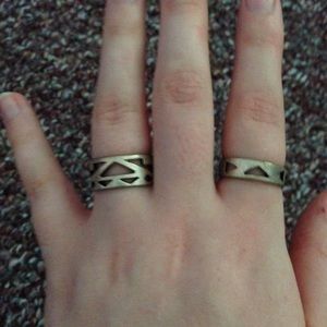 Two Silver Aztec Cut Design Rings