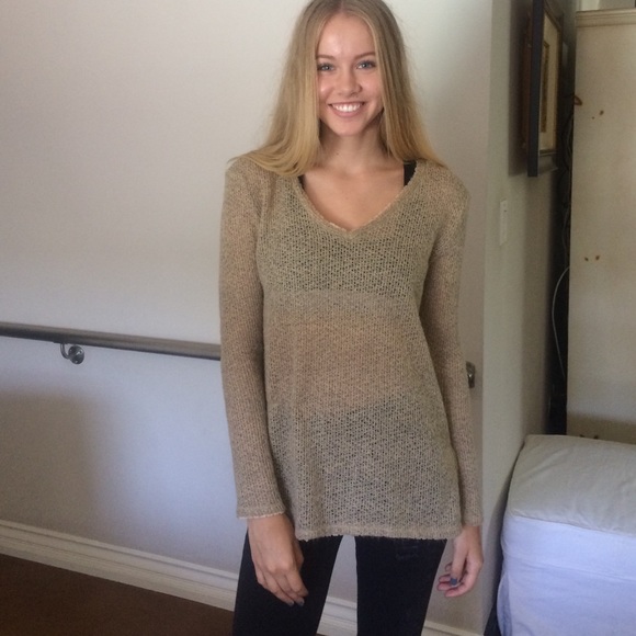 Bundle of tan sweater and Brandy black shorts.