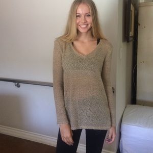 Bundle of tan sweater and Brandy black shorts.