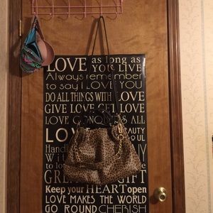 MG collection cheetah print purse.