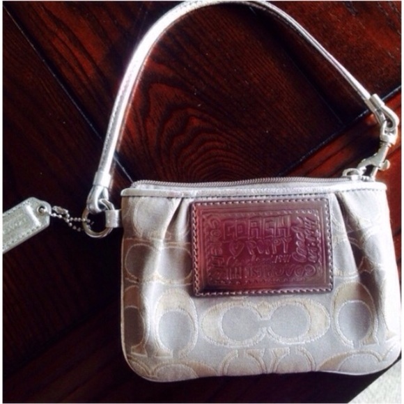 Silver coach wristlet