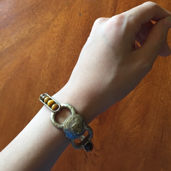 Gold bracelet with bead detail
