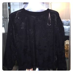 Shear waistline crop style black shirt