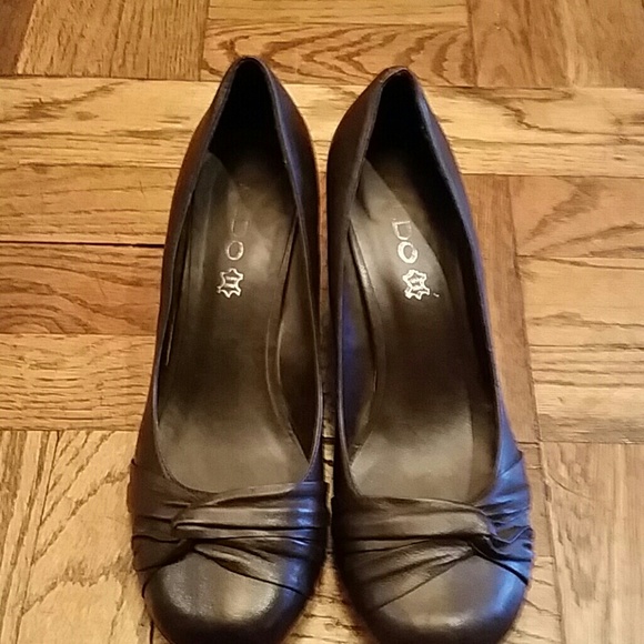 Brown leather shoes by Aldo