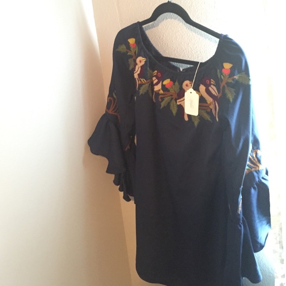 Navy dress with embroidered details