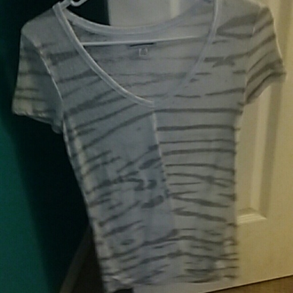 Gray & white striped shirt.