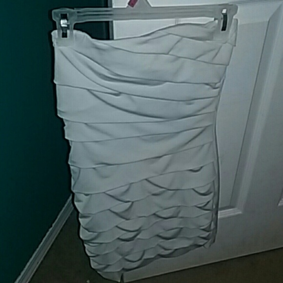 White, tight dress.