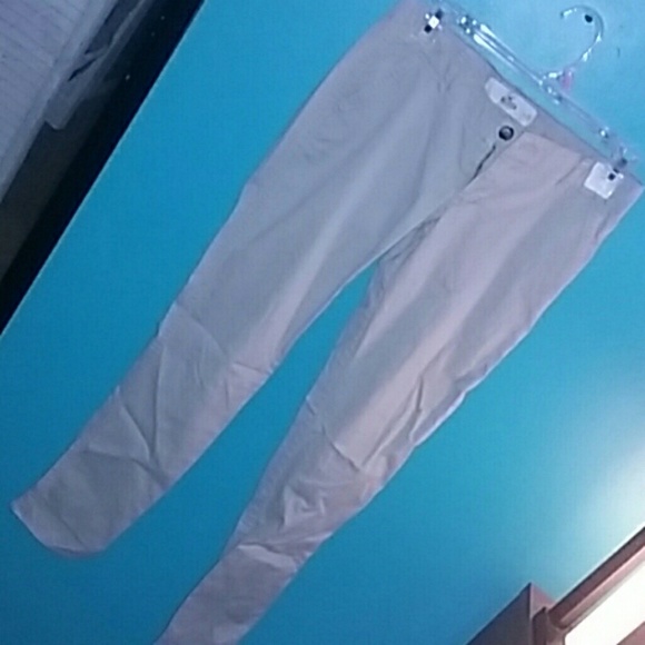 Tan skinny Hollister pants.