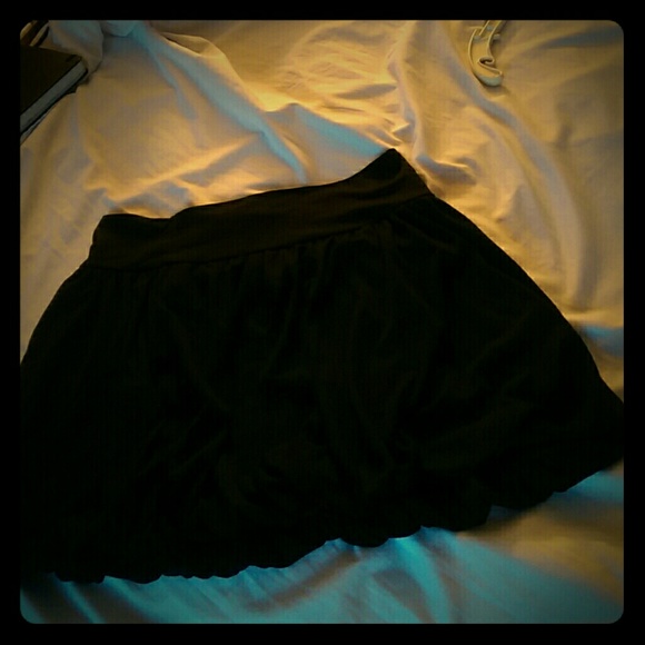 Black bustled mini skirt