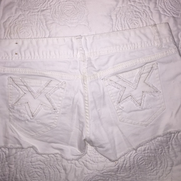 White Distressed cut off shorts w/ star pockets