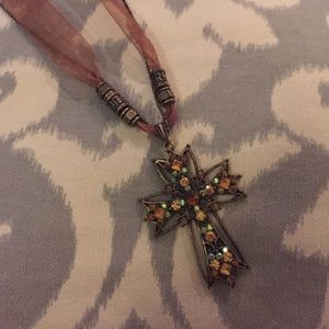 Cross pendant necklace.