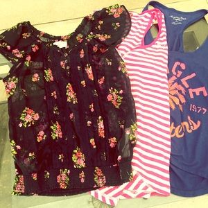 Three brand name shirts