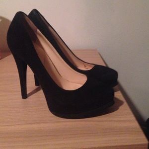 Black suede pumps