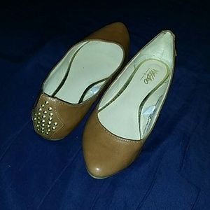 Pointy flats with studds on the back