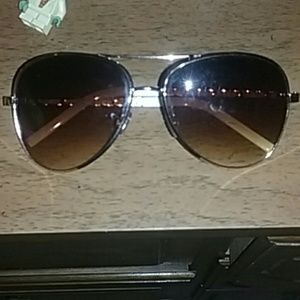 White & gold sunglasses.