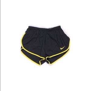 Grey and yellow Nike running shorts