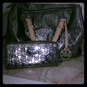 Barely worn Michael Kors purse and wallet set