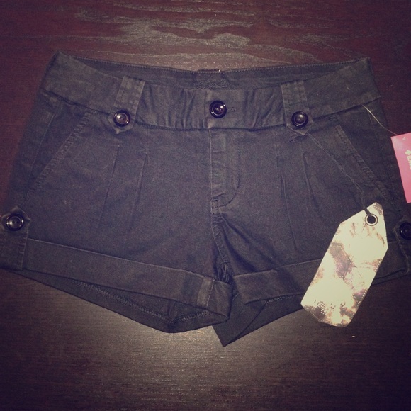 Black Shorts tags still attached