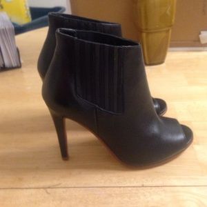 Black ankle boots. Open toe.