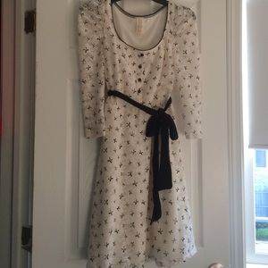 Ivory lace dress with black bow print