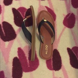 Gold brown and black aldo flip flops