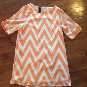 Francesca's cute orange and white chevron dress!