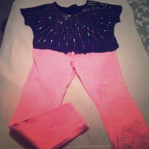 Top and pink jeans