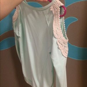 Sweater with lace cutouts