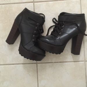 High lace up black boots