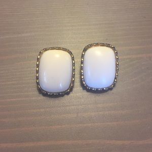 White earring with gold trim