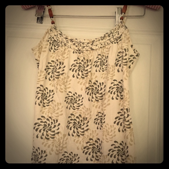 Cream tank with wooden beads on straps.