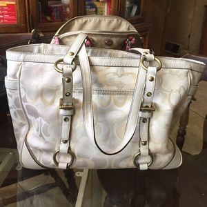 Coach signature optic east west