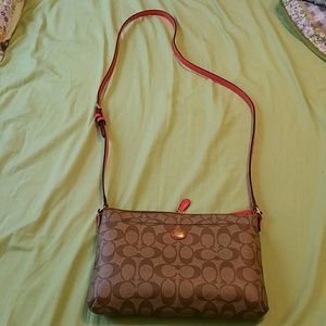 Coach East-West cross-body purse