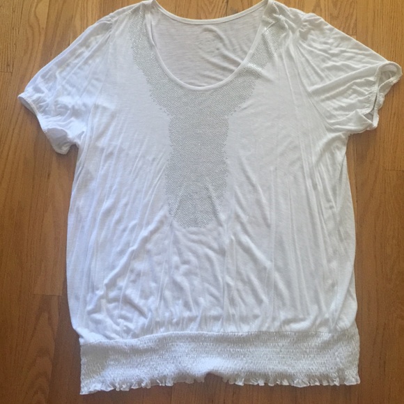 Pretty white top with silver bead design