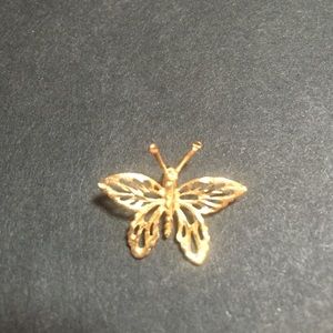 Gold butterfly pendant