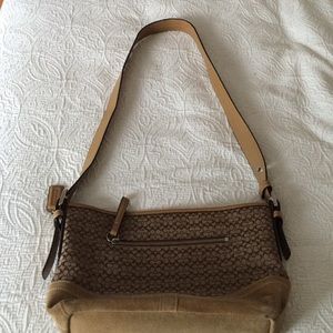 Tan-medium sized coach purse