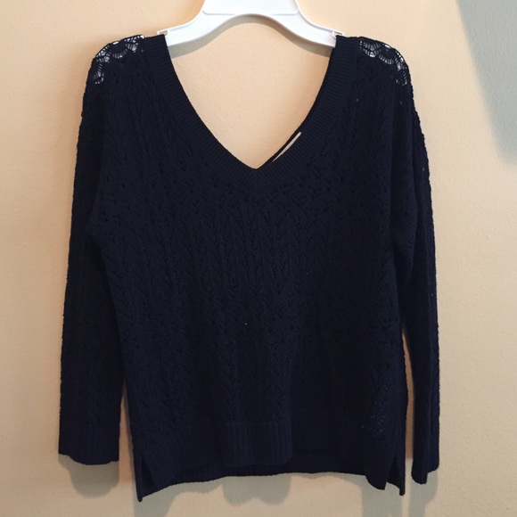 navy blue knitted v neck sweater