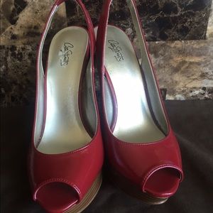 Red peep toe heels.