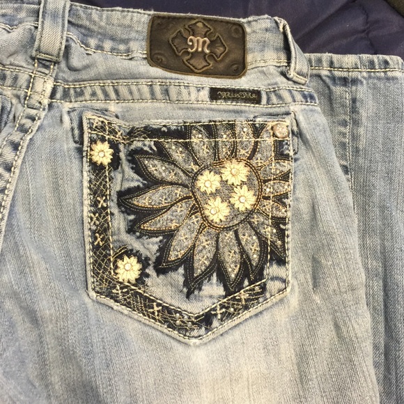 Miss Me "flower pocket" jeans.