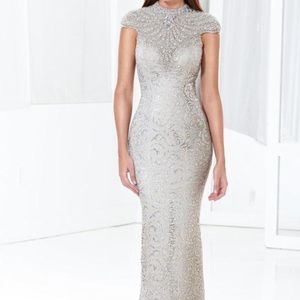 Glimmering cap-sleeved evening gown