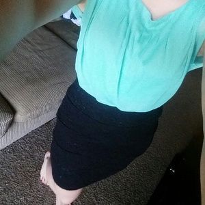 Form fitting turquoise/black dress