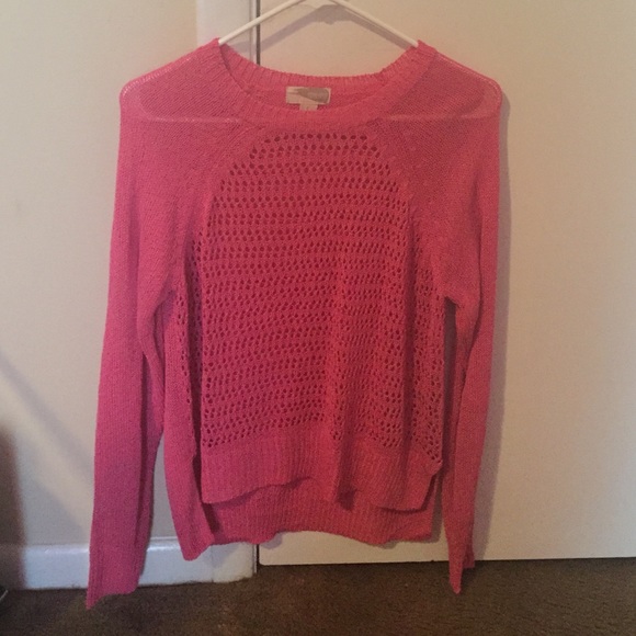 pink sweater. see through b/c of the little holes.