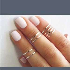 Above the knuckle rings