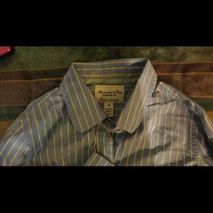 Blue with pin stripes button up top